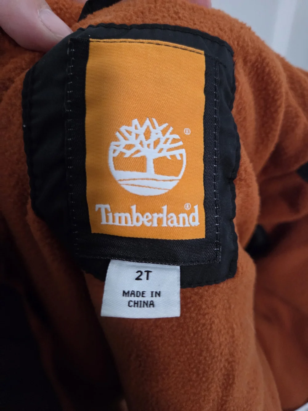 Timberland Kids' Black Puffer Jacket with Orange Lining